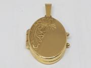 Zlatni medaljon oval sa gravurom