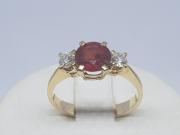 Gold ring with ruby and briliants